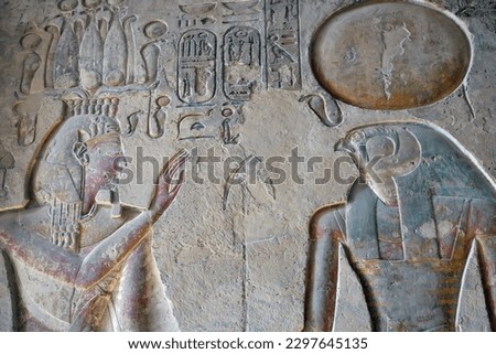 The falcon-headed god Horus welcomes the pharaoh to the afterlife in the Tomb of Ramses III in the Valley of the Kings Royalty-Free Stock Photo #2297645135