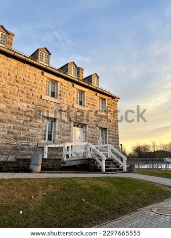 Ancestral building in the city of View Terrebonne in the province of Quebec located in the parc Île-des-Moulins. Picture taken at sunset of one of the most important seigneuries Quebec history
