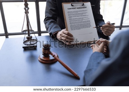 Consultation of Businesswoman Private office of a young Asian lawyer working on financial information in a private bank. to verify financial accounts and assist clients.