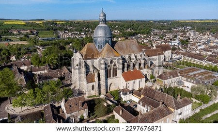 Aerial view of the Saint Quiriace Collegiate Church in Provins, a medieval city in Seine et Marne, France - Slate dome on top of a hill in the French countryside Royalty-Free Stock Photo #2297676871