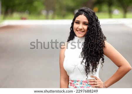 latin, brazilian girl beautiful young shy curly hair, outdoors, model, commercial, beauty, fashion, brand