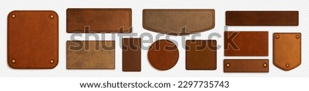 Set of brown isolated realistic leather patch. Label tag with seam template on transparent background. Vintage craft emblem design with string. Round and rectangle calfskin material sample, rivet Royalty-Free Stock Photo #2297735743