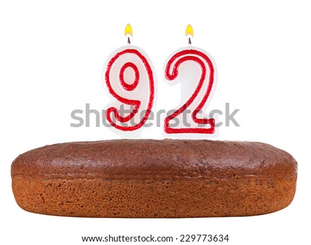 birthday cake with candles number 92 isolated on white background
