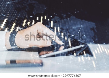 Multi exposure of abstract financial diagram with world map and hand working with a digital tablet on background, banking and accounting concept