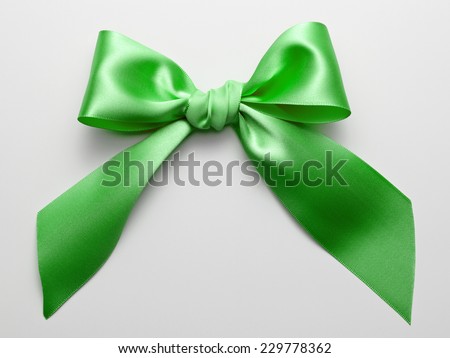 Green Ribbon Bow with Real Shadow isolated on White Background