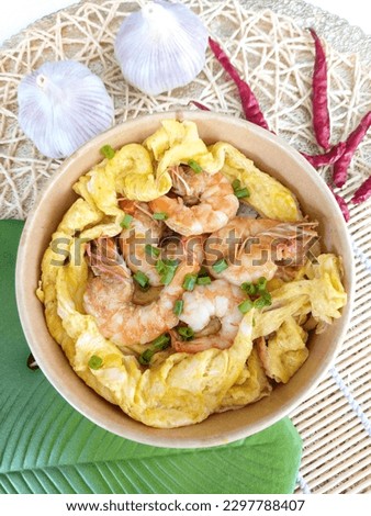 Appetizing Thai food menu "Shrimp Scrambled Eggs" Taken from the top view that looks delicious. The most popular food pictures right now
