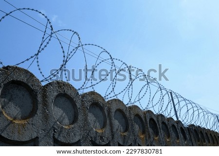 fence with barbed wire, restricted protected area