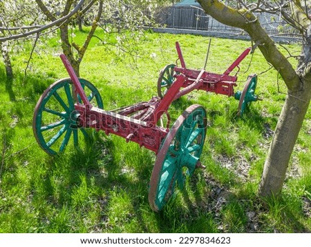 An artisan cart in an orchard is a picturesque picture of local tradition and agriculture.