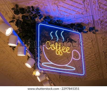 Purple Coffee neon sign in the roof