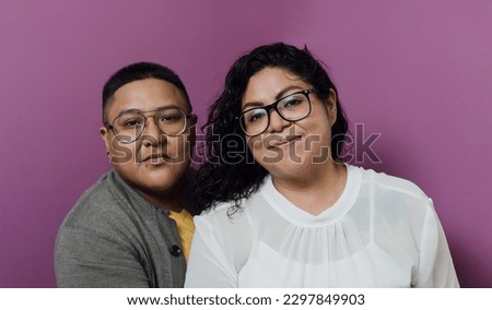 Latin lesbian couple portrait in Mexico, Hispanic homosexual people from lgbt community in Latin America