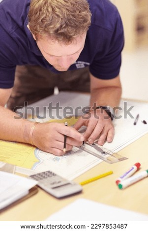 Map, man working and sea marine investigation with a drawing and ruler on a table. Sailing strategy, rescue and boat worker with navigation paperwork with lifeguard planning and distance calculation