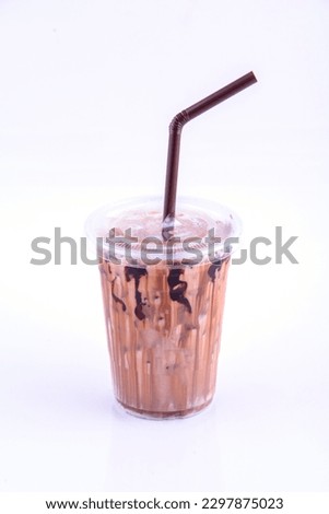 Mocha latte. Beverage for summer with brick wall background.