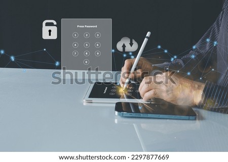 Cyber security and Security password login online concept Hands press number password of social media, logging in with tablet  to an online bank account, data protection hacker
