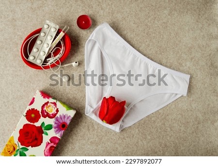 Women's pant underwear.Concept of critical days,menstrual pain,menstruation,menstrual cycle,pms,women's health,feminine hygiene,gynecology,menopause,virginity.Top view,flat lay.