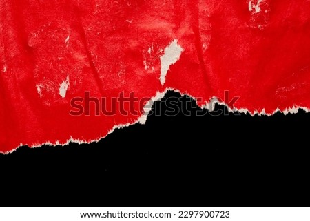 Red ripped paper torn edges strips isolated on black background Royalty-Free Stock Photo #2297900723