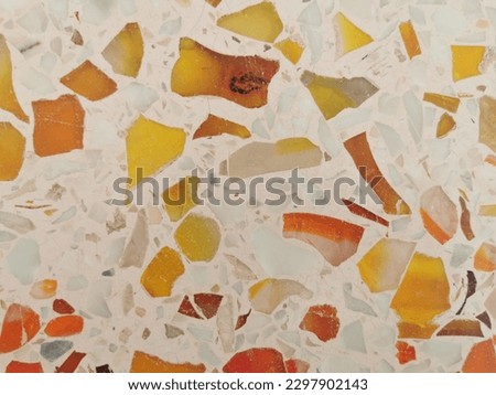 Beautiful​ patterned​ marble​ back​ground​ image​ in​ various​ colors, including​ blue, red, green​