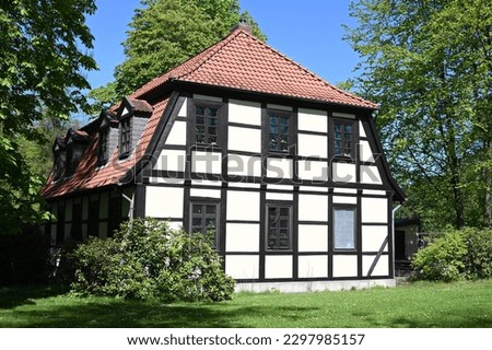 Historic half-timbered house in Stadthagen with hipped roof Royalty-Free Stock Photo #2297985157