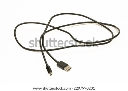 Cable connection for mini display port to display port on white background.