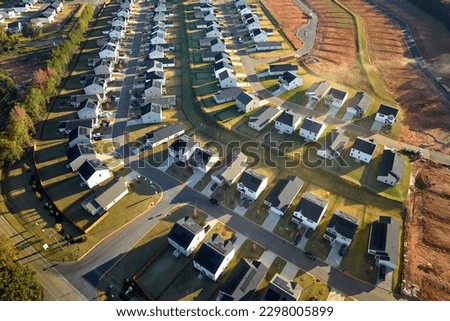 View from above of densely built residential houses under construction in south Carolina residential area. American dream homes as example of real estate development in US suburbs Royalty-Free Stock Photo #2298005899