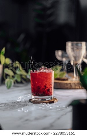 Bramble Cocktail refreshing gin, lemon juice, syrup and blackberries Royalty-Free Stock Photo #2298053161