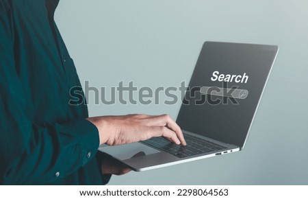 Business man searching information data on internet on toolbar browser. Searching technology and data information concept.