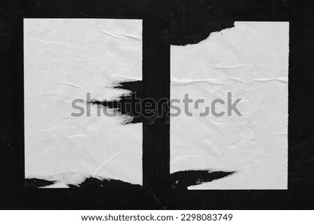 Two white sheets with folds on a black background. Royalty-Free Stock Photo #2298083749