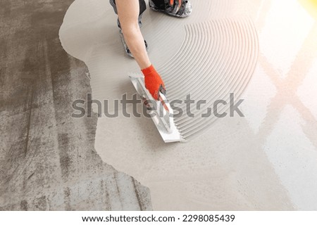 New screed concrete with mixture of cement for leveling for floors. Royalty-Free Stock Photo #2298085439