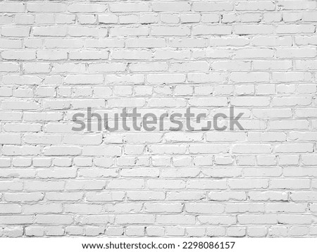 Background texture of white cement facade tiles. Stone brick wall with rectangular pattern, light concrete. Building cladding, architectural masonry