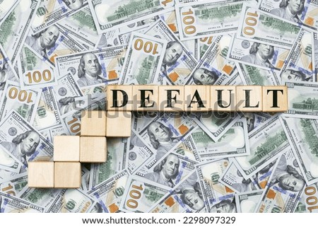 Background of US dollar bills with word default on a wooden ladder. crisis escalation Royalty-Free Stock Photo #2298097329
