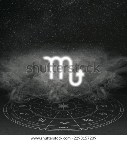 Abstract image of the sign of the zodiac Scorpio against the background of the starry sky and smoke