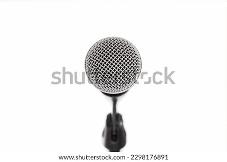 close front view of a profosssionnal microphone isolated on white background