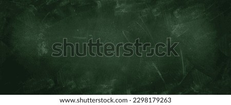 Chalk rubbed out on green chalkboard background Royalty-Free Stock Photo #2298179263