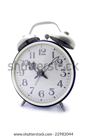 Old blue alarm clock on a white background