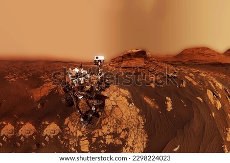 A rover on the surface of the red planet Mars. Elements of this image furnished NASA. . High quality photo