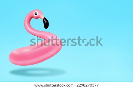 Trendy Summer composition made of pink flamingo inflatable on bright light blue background.Minimal summer concept.Creative art,Contemporary style.Banner background with writing space and copy space. Royalty-Free Stock Photo #2298270377