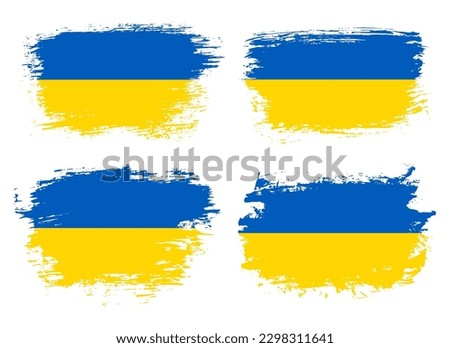 Artistic Ukraine country brush flag collection. Set of grunge brush flags on a solid background
