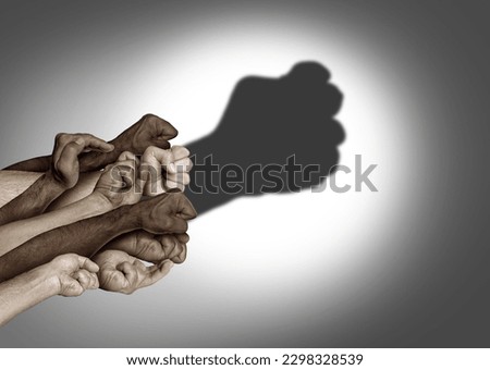 United For Justice as a social unity to fight for the rights of society as a group of diverse hands casting the shape of a fist as brotherhood as group strength and togetherness for a just cause. Royalty-Free Stock Photo #2298328539