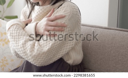 Asian women in the cold Royalty-Free Stock Photo #2298381655