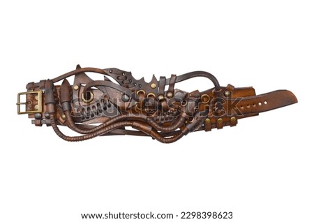 Steampunk leather bracelet. Handicraft. Accessories and decorations for mtalheads, rockers, punks, bikers, goths. Royalty-Free Stock Photo #2298398623