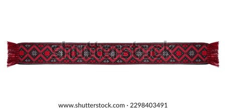 Embroidered scarf with a traditional Ukrainian pattern - vyshyvanka. Stylish clothing accessory. Ukrainian style and fashion.