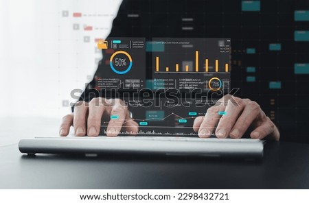 Analyst computer working with information database to analysis marketing sale data. Business project or program strategy planning and development for corporate operating finance and investment concept Royalty-Free Stock Photo #2298432721
