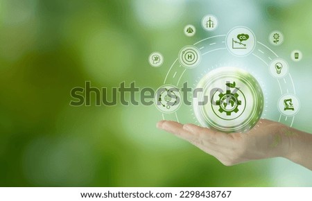 Natural climate solutions concept. Action for avoid greenhouse gas emissions and increase carbon storage in forests, grassland and wetlands. Gears and globe with leafs on nature background. Royalty-Free Stock Photo #2298438767