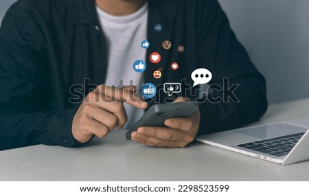 Man using smartphone with social media Social media and digital online concept The concept of living on vacation and playing social media. social distancing work from home