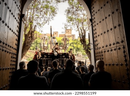 Holy Week in Andalusia is a religious celebration with processions venerating images of Christ and the Virgin Mary. Photographs capture the beauty and devotion of this event. Royalty-Free Stock Photo #2298551199