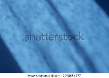 blue background with sunlight and shadow