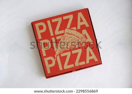 Paper carton take away pizza box in white background                         