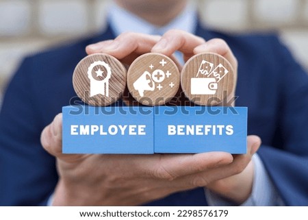 Businessman holding colorful blocks with icons and inscription: EMPLOYEE BENEFITS. Concept of Employee Benefits Career. Business Bonus Work Perks. Royalty-Free Stock Photo #2298576179