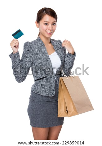 Businesswoman hold with credit card and shopping bag