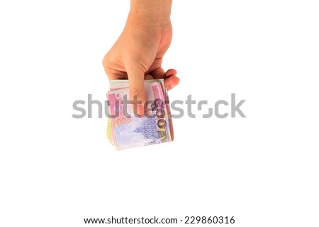 right hand holding thailand paper currency from the top isolated on white