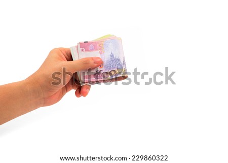  hand holding thailand paper currency isolated on white